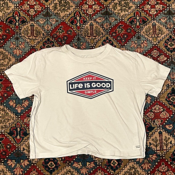 Life Is Good Tops - Cropped LIFE IS GOOD tee
Size: xs but fits a S and M Color: white